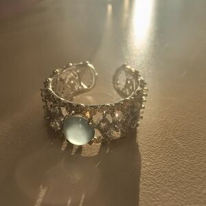Elegant Silver Ring with Blue Gem